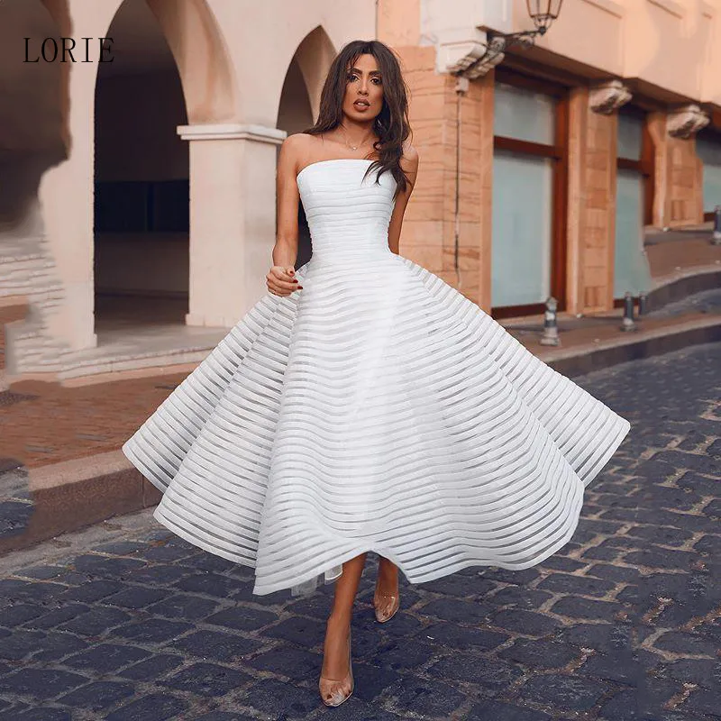 LORIE Princess Short Wedding Dress 2020 Strapless Puff Bride Dress A-Line Backless Mid-Calf Boho Wedding Gown
LORIE Princess Short Wedding Dress 2020 Strapless Puff Bride Dress A-Line Backless Mid-Calf Boho Wedding Gown