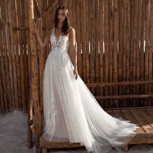 Sexy V-Neck Wedding Dress 2022 Summer Lace Appliques Sleeveless Backless Court Train Robe De Mariée Elegant For Women Organza
Sexy V-Neck Wedding Dress 2022 Summer Lace Appliques Sleeveless Backless Court Train Robe De Mariée Elegant For Women Organza