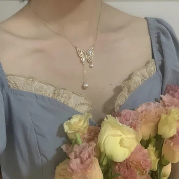 Korea New Fashion Jewelry Exquisite Copper Inlaid Zircon Butterfly Pendant Necklace Elegant Pearl Female Clavicle Necklace 
Korea New Fashion Jewelry Exquisite Copper Inlaid Zircon Butterfly Pendant Necklace Elegant Pearl Female Clavicle Necklace