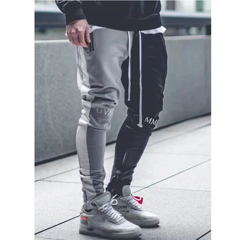 2020 new casual men's sports pants cotton stitching Slim pants men's stretch contrast color gym fitness sports pants 
2020 new casual men's sports pants cotton stitching Slim pants men's stretch contrast color gym fitness sports pants