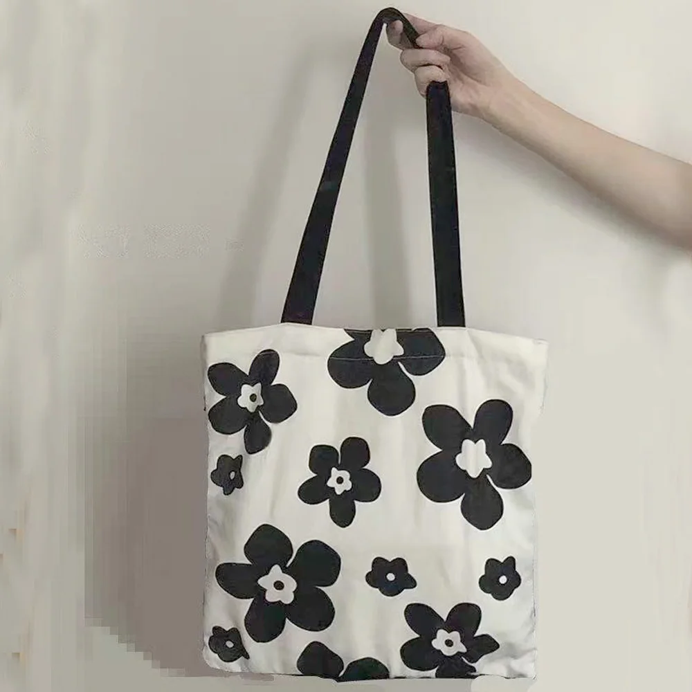 No. HTB-20 high-capacity portable single-shoulder bag canvas bag with black white flowers for women shopping bag
No. HTB-20 high-capacity portable single-shoulder bag canvas bag with black white flowers for women shopping bag