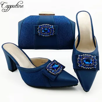 Fashionable darkblue pointed toe slipper shoes matching with evening bag set QSL012 heel height 9cm
Fashionable darkblue pointed toe slipper shoes matching with evening bag set QSL012 heel height 9cm