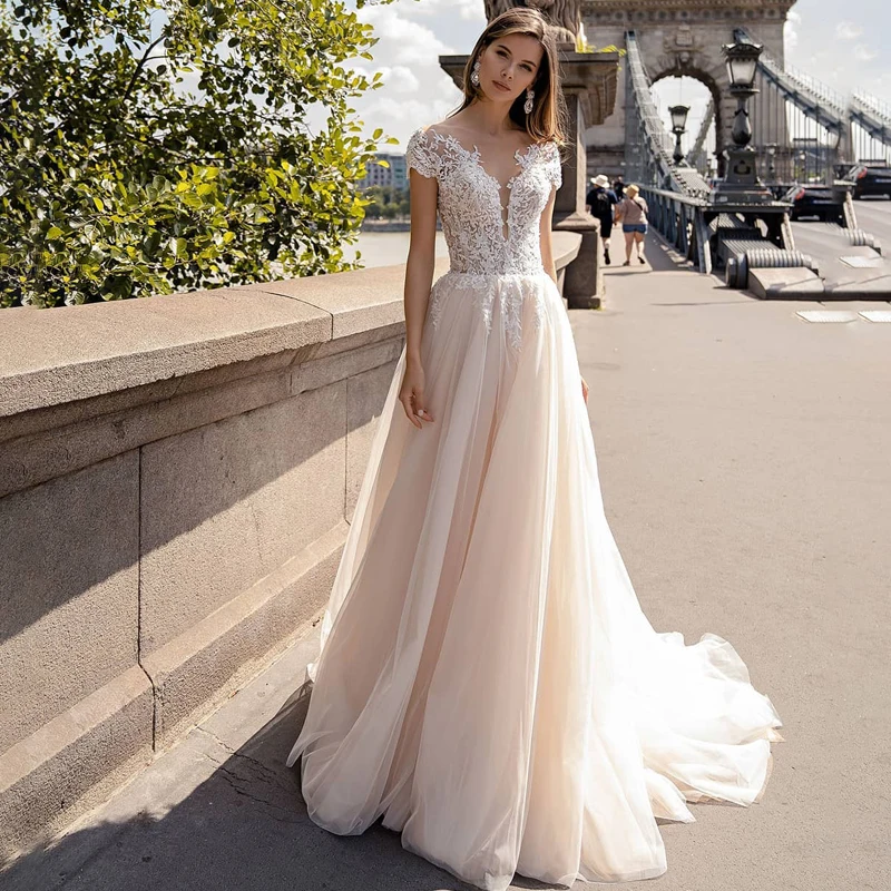 New Design Scoop Cap Sleeve Appliques Lace Buttons A-Line Tulle Wedding Dress 2022 Bridal Gowns Vestido De Noiva
New Design Scoop Cap Sleeve Appliques Lace Buttons A-Line Tulle Wedding Dress 2022 Bridal Gowns Vestido De Noiva