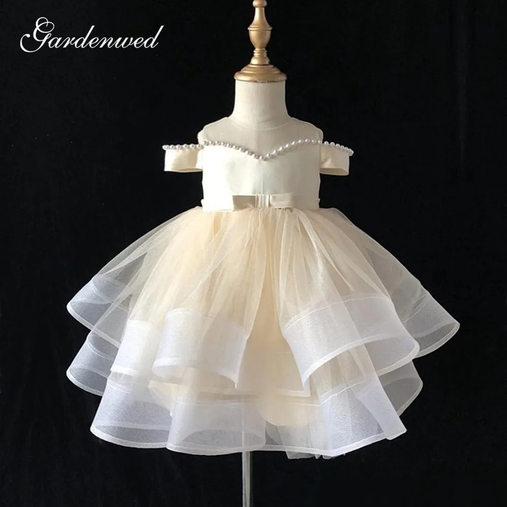 Light Champagne Pearls Flower Girl Dresses Off Shoulder Tiered Tulle Communion Dresses Big Bow Short Girl Wedding Party Dress
Light Champagne Pearls Flower Girl Dresses Off Shoulder Tiered Tulle Communion Dresses Big Bow Short Girl Wedding Party Dress