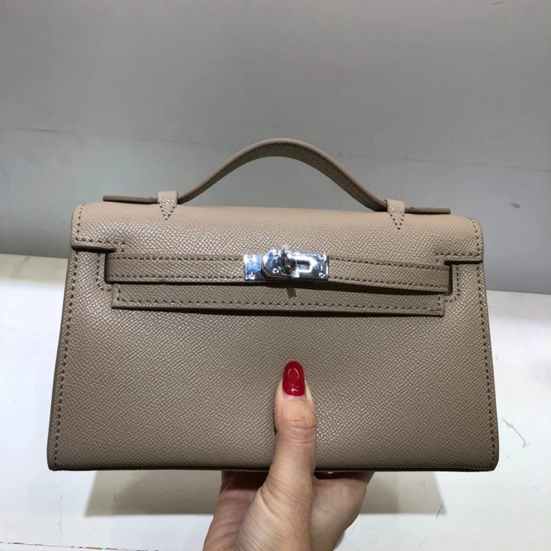 New Kel bag retractable hand palm pattern cross pattern two-layer leather shoulder bag small bag 2019 fashion
New Kel bag retractable hand palm pattern cross pattern two-layer leather shoulder bag small bag 2019 fashion