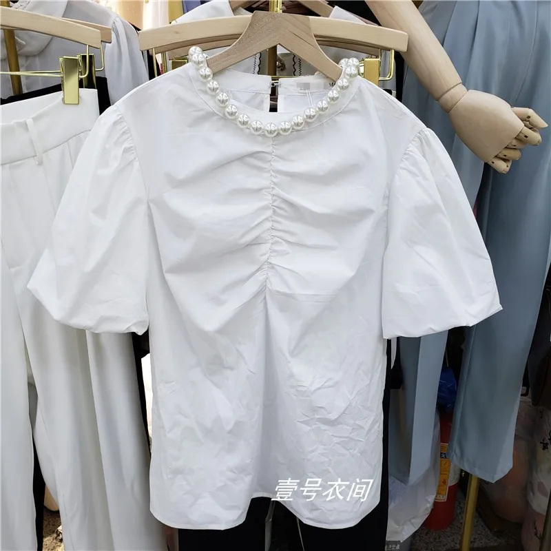 Womens Blouses Tops 2020 Spring and Summer New Short Sleeve Pearl Beaded Pleated Solid Color Puff Sleeve Loose Shirt Woman White
Womens Blouses Tops 2020 Spring and Summer New Short Sleeve Pearl Beaded Pleated Solid Color Puff Sleeve Loose Shirt Woman White
