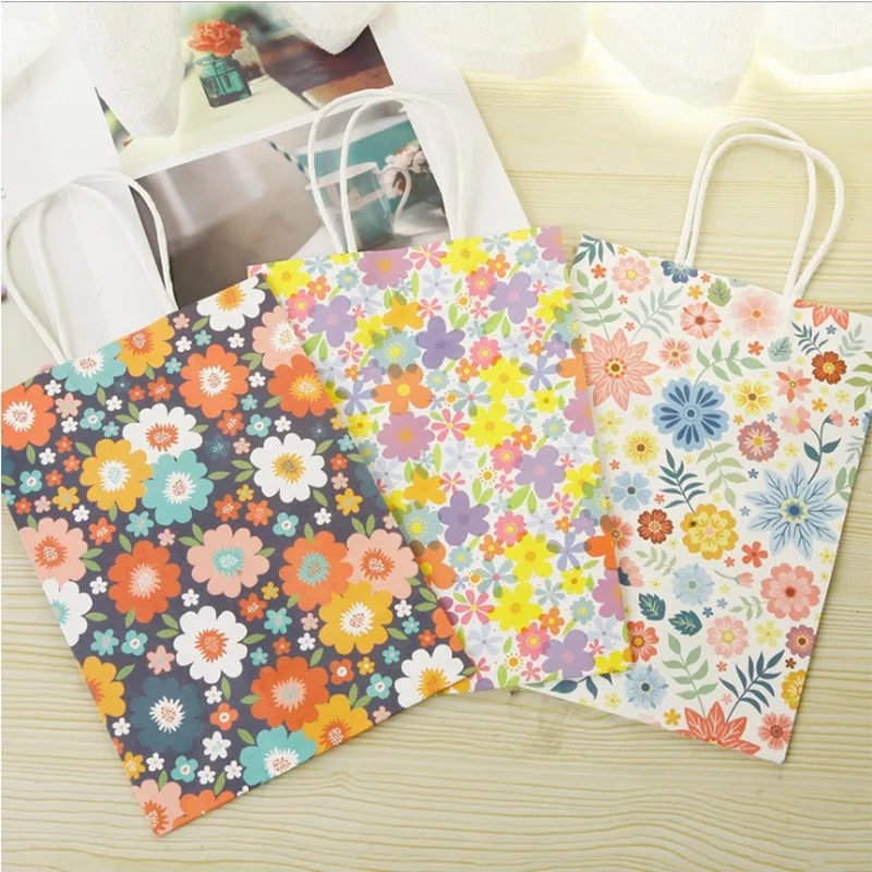 10pcs/lot Storage bag Floral gift sun flower kraft paper tote bag Stationery storage 3styles DIY 21*15*8CM
10pcs/lot Storage bag Floral gift sun flower kraft paper tote bag Stationery storage 3styles DIY 21*15*8CM
