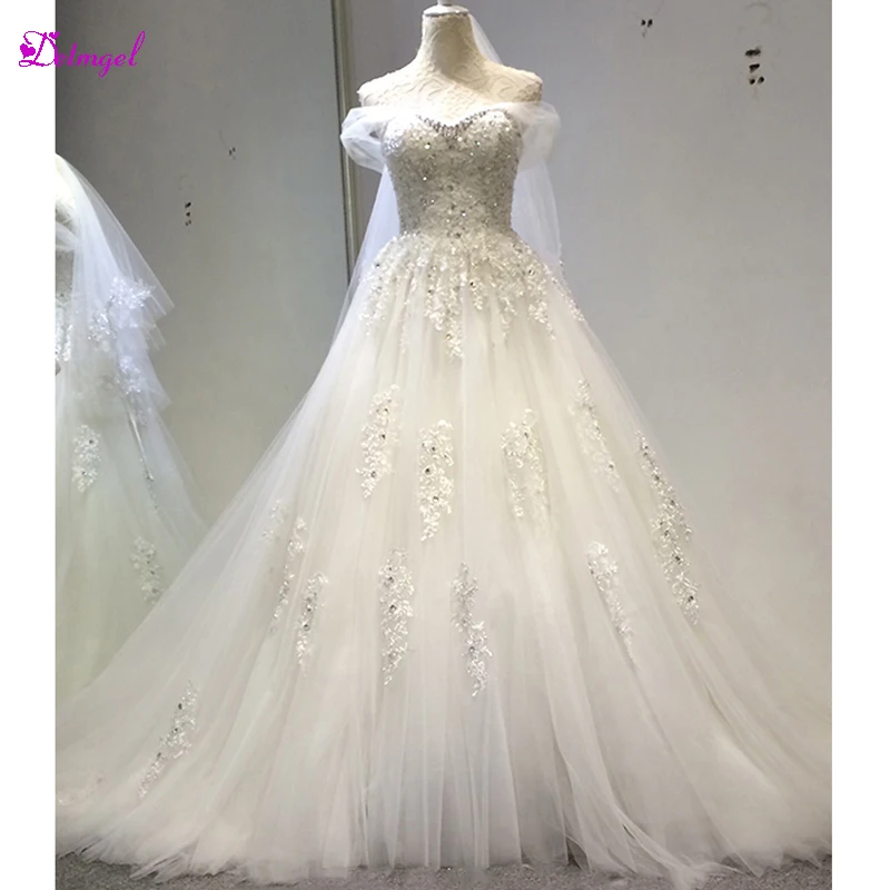 Detmgel Boat Neck Lace Up Sweep Train A-Line Wedding Dresses 2020 Luxury Appliques Beaded Vintage Bridal Gown Vestido de Noiva 
Detmgel Boat Neck Lace Up Sweep Train A-Line Wedding Dresses 2020 Luxury Appliques Beaded Vintage Bridal Gown Vestido de Noiva