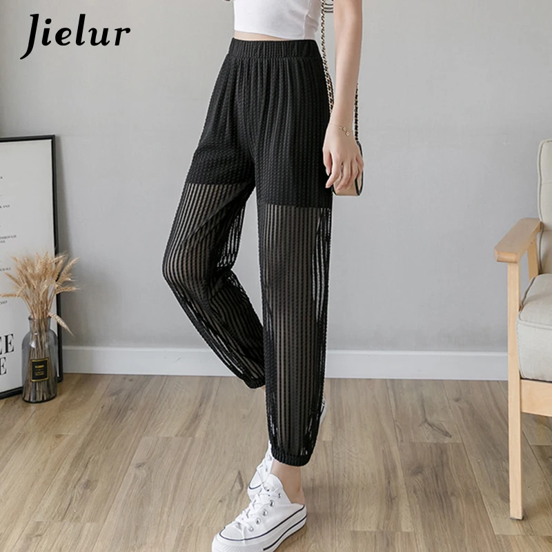 Jielur S-3XL Size Women Pants Summer Thin Perspective Loose Mesh Harem Pants Female Sunscreen Casual Black Chiffon Bloomers
Jielur S-3XL Size Women Pants Summer Thin Perspective Loose Mesh Harem Pants Female Sunscreen Casual Black Chiffon Bloomers
