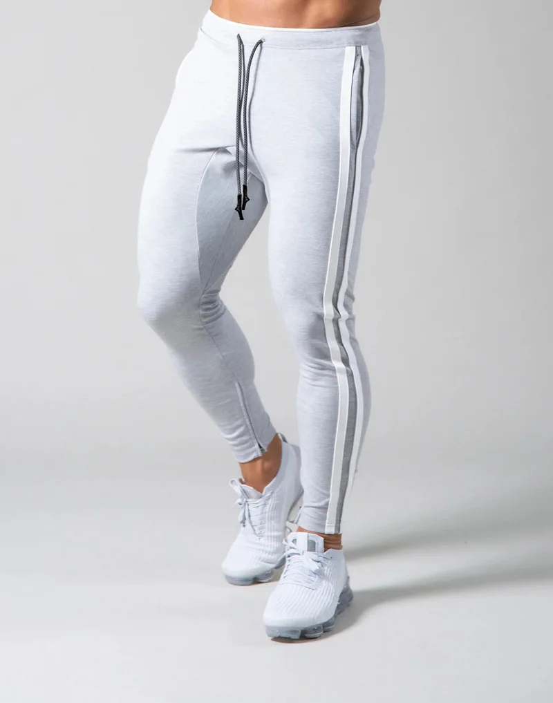 Autumn Men's fitness joggers skinny sweatpants men's gym bodybuilding training cotton track pants casual pencil pants gray 
Autumn Men's fitness joggers skinny sweatpants men's gym bodybuilding training cotton track pants casual pencil pants gray