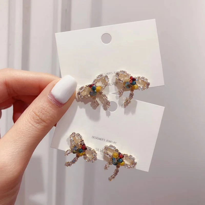 MENGJIQIAO New Korean Sweet Crystal Bowknot Zircon Stud Earrings For Women Girls Cute Boucle D'oreille Jewelry Accessories
MENGJIQIAO New Korean Sweet Crystal Bowknot Zircon Stud Earrings For Women Girls Cute Boucle D'oreille Jewelry Accessories