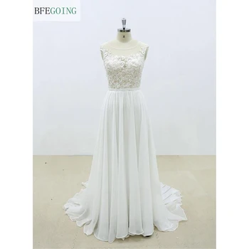 Ivory Chiffon Lace Appliques Floor-length Scoop Sleeveless A-line Wedding dress Chapel Train Custom made
Ivory Chiffon Lace Appliques Floor-length Scoop Sleeveless A-line Wedding dress Chapel Train Custom made