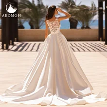 Aedmgh A-Line Matte Satin Wedding Dresses 2021 O-Neck Sleeveless Robe De Mariee Beaded Lace Princess Simple Vestido De Novia
Aedmgh A-Line Matte Satin Wedding Dresses 2021 O-Neck Sleeveless Robe De Mariee Beaded Lace Princess Simple Vestido De Novia