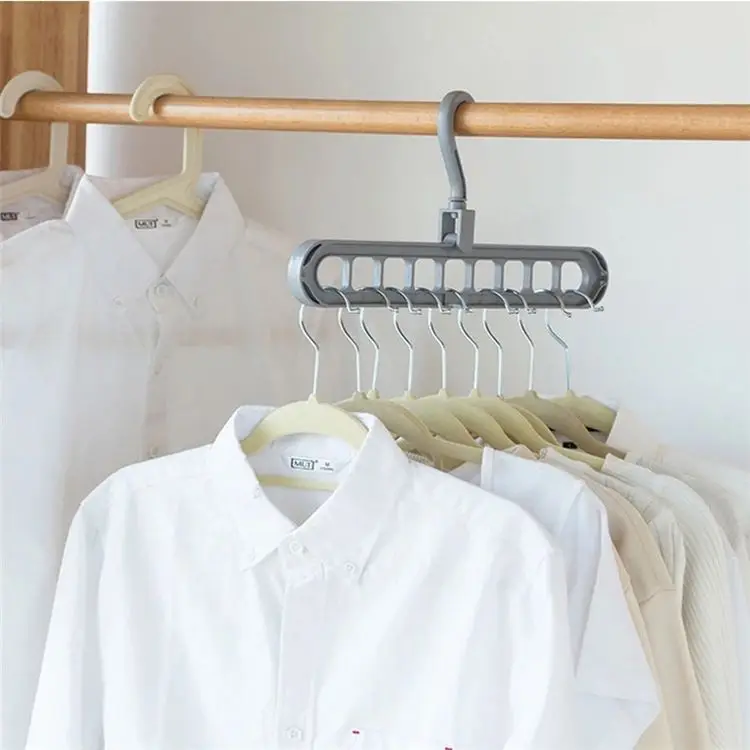 Space saving 9 holes 360 degree rotating magic hanger multi-purpose folding clothes hanger wardrobe clothes clothes storag 
Space saving 9 holes 360 degree rotating magic hanger multi-purpose folding clothes hanger wardrobe clothes clothes storag