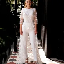 Boho Elegant Jumpsuit O-Neck Wedding Dress 2021 Lace Appliques 3/4 Sleeve Backless Tulle Button Simple Bride Gown Robe De Mariée
Boho Elegant Jumpsuit O-Neck Wedding Dress 2021 Lace Appliques 3/4 Sleeve Backless Tulle Button Simple Bride Gown Robe De Mariée