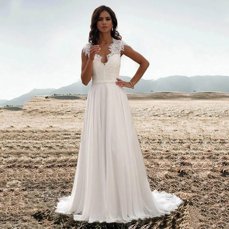 2020 Chiffon Beach Wedding Dresses Cap Sleeve V-neck Lace Applique A-line Wedding Gowns Custom Plus Size Vestido De Noiva
2020 Chiffon Beach Wedding Dresses Cap Sleeve V-neck Lace Applique A-line Wedding Gowns Custom Plus Size Vestido De Noiva