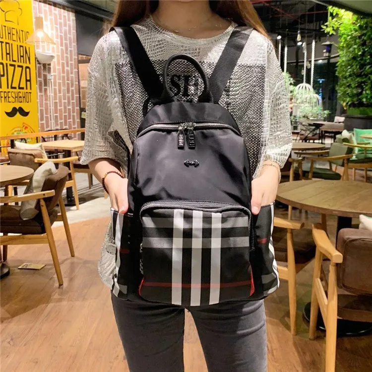 Women's Backpack with Double Shoulders and Black Chequered Oxford Cloth Bag for Leisure Women's Backpack 
Women's Backpack with Double Shoulders and Black Chequered Oxford Cloth Bag for Leisure Women's Backpack