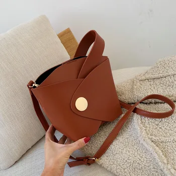 Bucket bag new fashion Korean version of the messenger net red small bag wild foreign style solid color shoulder bag hand bags
Bucket bag new fashion Korean version of the messenger net red small bag wild foreign style solid color shoulder bag hand bags