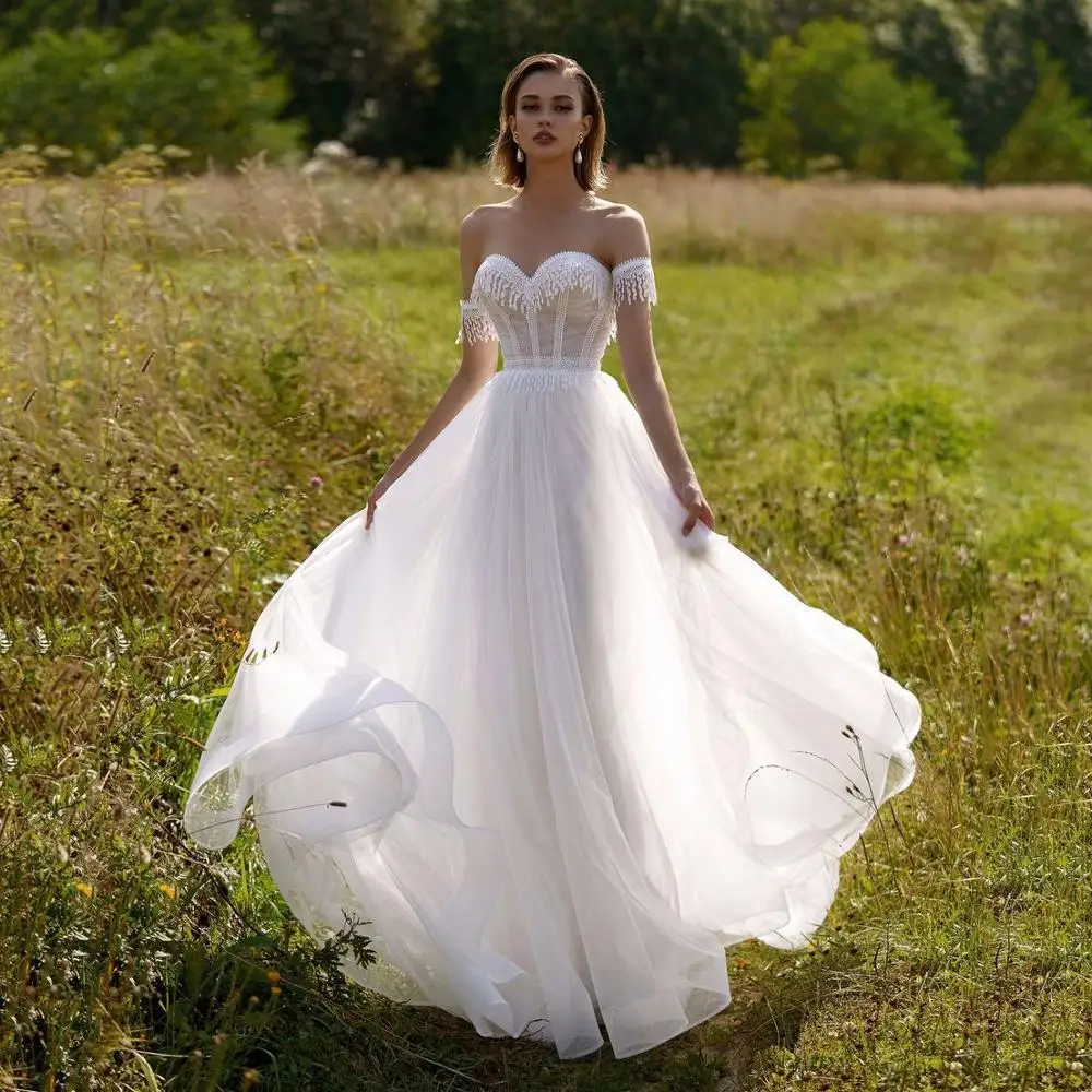 Thinyfull Princess Tassel Sweetheart A Line Lace Wedding Dresses Off The Shoulder Tulle Button Appliques Sweep Train Bridal Gown
Thinyfull Princess Tassel Sweetheart A Line Lace Wedding Dresses Off The Shoulder Tulle Button Appliques Sweep Train Bridal Gown