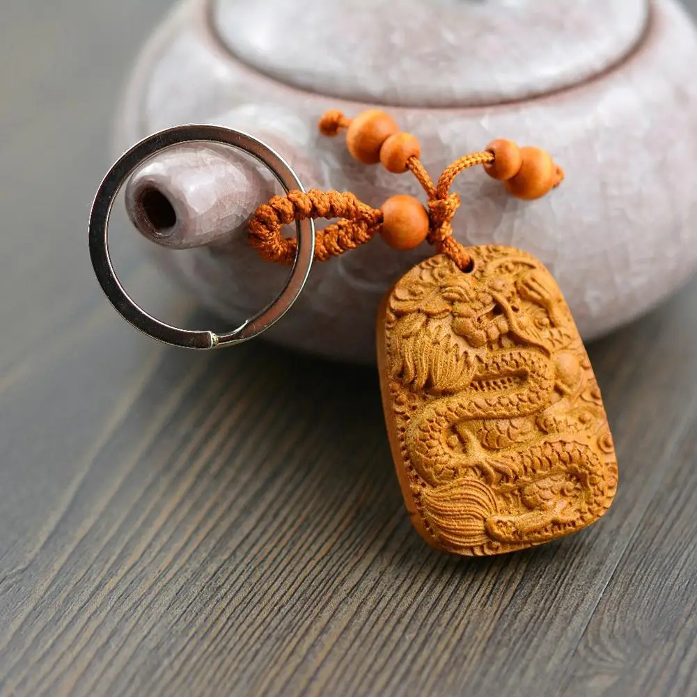Peach Wood Carving Chinese Dragon Lucky Statue Pendant Buckle Keychain Keyring Chinese dragon statue carved good luck and happys
Peach Wood Carving Chinese Dragon Lucky Statue Pendant Buckle Keychain Keyring Chinese dragon statue carved good luck and happys
