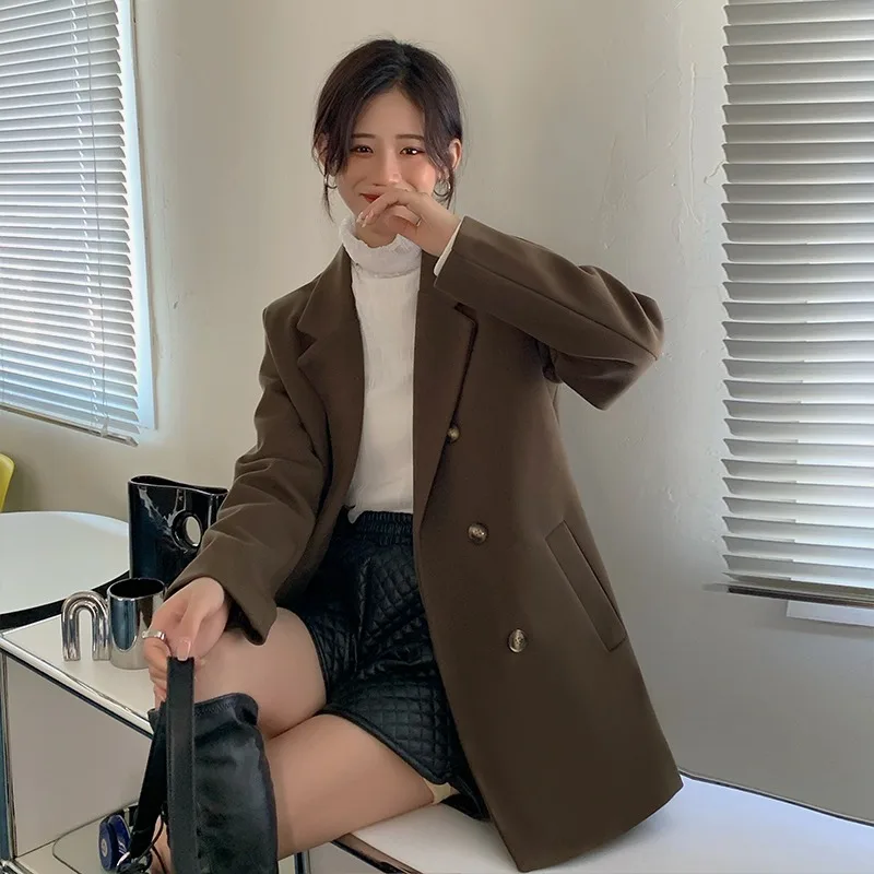 Autumn and winter woolen casual suit coat women's 2021 new loose and thin temperament small suit top fashion
Autumn and winter woolen casual suit coat women's 2021 new loose and thin temperament small suit top fashion