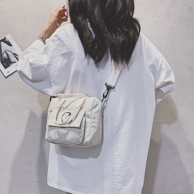 Korea Japanese Harajuku dark fan can tooling canvas bag female all-match solid color student shoulder messenger bag
Korea Japanese Harajuku dark fan can tooling canvas bag female all-match solid color student shoulder messenger bag