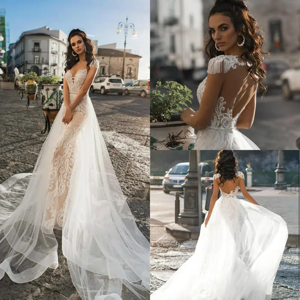 2019 Open Back Mermaid Wedding Dress with Detachable Train Tassels Cap Sleeve Lace Applique Boho Beach Vestido De Novia
2019 Open Back Mermaid Wedding Dress with Detachable Train Tassels Cap Sleeve Lace Applique Boho Beach Vestido De Novia