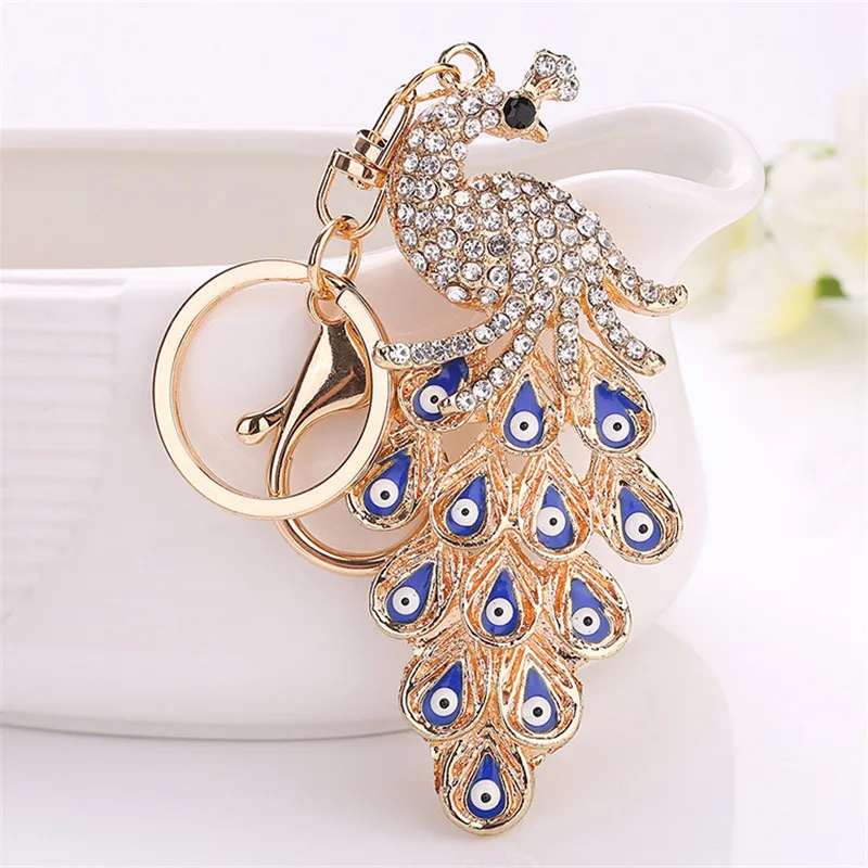Colorful Peacock Diamond Keychain Crystal Golden Color 3D Chain Charm Car Pendant Keychain Key Ring
Colorful Peacock Diamond Keychain Crystal Golden Color 3D Chain Charm Car Pendant Keychain Key Ring