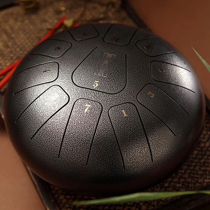 New Tongue Drum F Empty Ethereal Drummer Disc Tank 11 Tone 8 inch Drum Steel Hollow Drum Hand pan Music Instruments for Yoga
New Tongue Drum F Empty Ethereal Drummer Disc Tank 11 Tone 8 inch Drum Steel Hollow Drum Hand pan Music Instruments for Yoga
