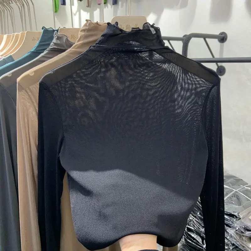Black Sexy Women Blouses See Through Transparent Mesh High Neck Long Sleeve Skinny Blouse Shirt Lady Top T-shirt Spring Cloth
Black Sexy Women Blouses See Through Transparent Mesh High Neck Long Sleeve Skinny Blouse Shirt Lady Top T-shirt Spring Cloth