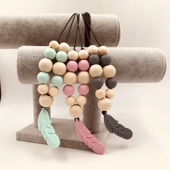 DHL 100pcs Fashion Necklace Silicone Feather Beads Teether Nursing Accessories DIY Teething Necklace BPA Free Silicone Teether
DHL 100pcs Fashion Necklace Silicone Feather Beads Teether Nursing Accessories DIY Teething Necklace BPA Free Silicone Teether