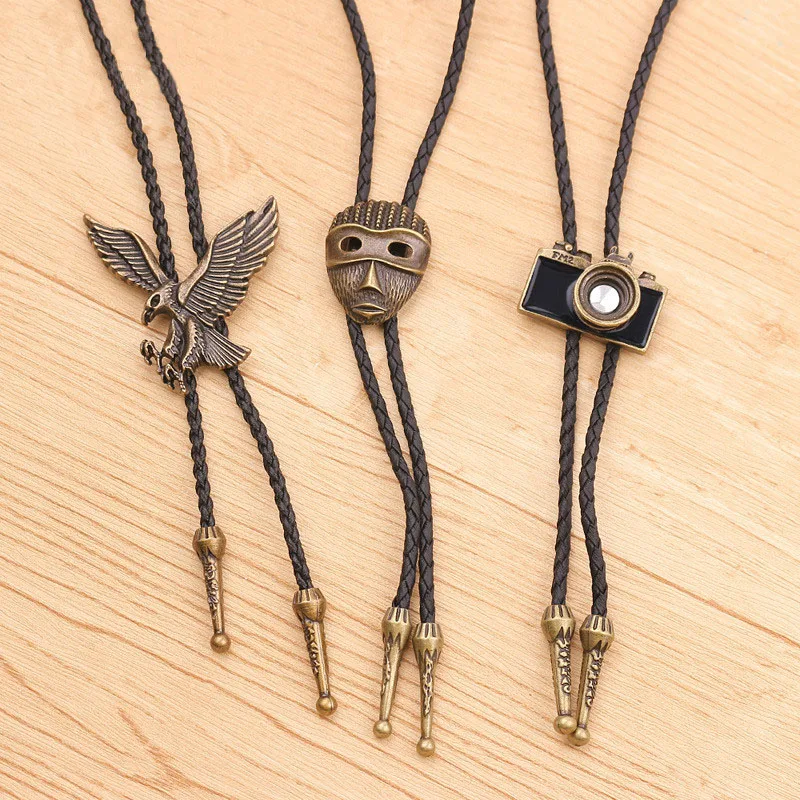 Fashion Bolo Tie Hand-knitted Leather Rope Long Sweater Chain Retro Camera Eagle Mask Necklace Wholesale Bow Tie
Fashion Bolo Tie Hand-knitted Leather Rope Long Sweater Chain Retro Camera Eagle Mask Necklace Wholesale Bow Tie
