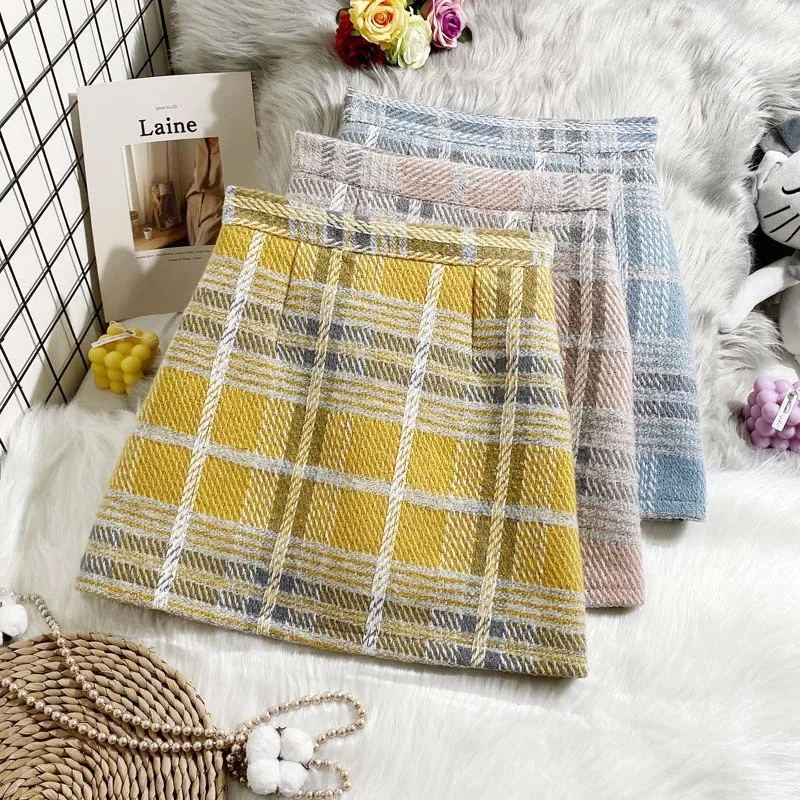Woolen Plaid A-Line Skirt Women High-Waist Autumn Autumn Slim Fashion Casual Vintage Designer Joker Skirts Gentlewoman Bottoms
Woolen Plaid A-Line Skirt Women High-Waist Autumn Autumn Slim Fashion Casual Vintage Designer Joker Skirts Gentlewoman Bottoms