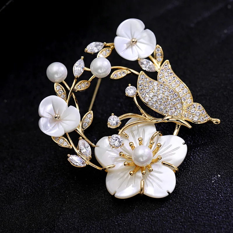 

OKILY Luxury AAA Zircon Brooches for Women Christmas Butterfly Shell Flower Brooch Pin Overcoat Accessories New Year Gift 2021