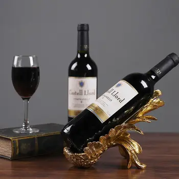 Creative Home Crafts European Retro Golden Feather Wine Rack Resin Living Room Ornaments Model Gift Home Wine Cabinet Decoration
Creative Home Crafts European Retro Golden Feather Wine Rack Resin Living Room Ornaments Model Gift Home Wine Cabinet Decoration