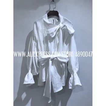 Women's linen shirt tops Women's round neck long-sleeved shirt belts tops Asymmetrical linen bowknot personality loose shirt top 
Women's linen shirt tops Women's round neck long-sleeved shirt belts tops Asymmetrical linen bowknot personality loose shirt top