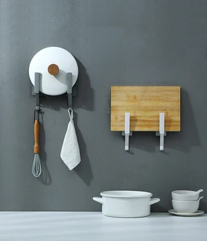 Non-perforating multi-purpose lid rack cutting board wall-mounted kitchen storage chopping board rack kitchen hook 
Non-perforating multi-purpose lid rack cutting board wall-mounted kitchen storage chopping board rack kitchen hook