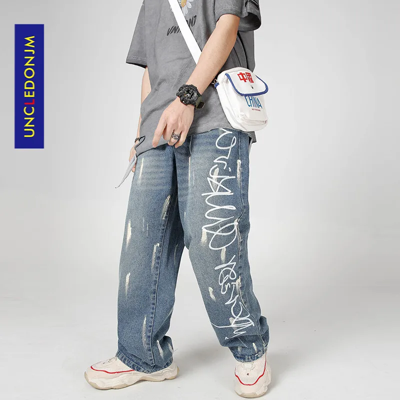 UNCLEDONJM Graffiti Splashed Ink Printing Jeans Men's Trendy and Casual Straight Pants Hip-hop Street mens jeans HD-B069
UNCLEDONJM Graffiti Splashed Ink Printing Jeans Men's Trendy and Casual Straight Pants Hip-hop Street mens jeans HD-B069
