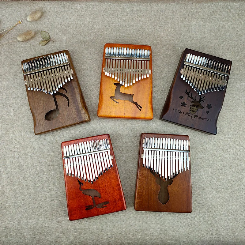 17 Keys Kalimba Thumb Piano High Quality Wood Mahogany Body Musical Instruments With Learning Book Tuning Hammer Kalimba Piano
17 Keys Kalimba Thumb Piano High Quality Wood Mahogany Body Musical Instruments With Learning Book Tuning Hammer Kalimba Piano
