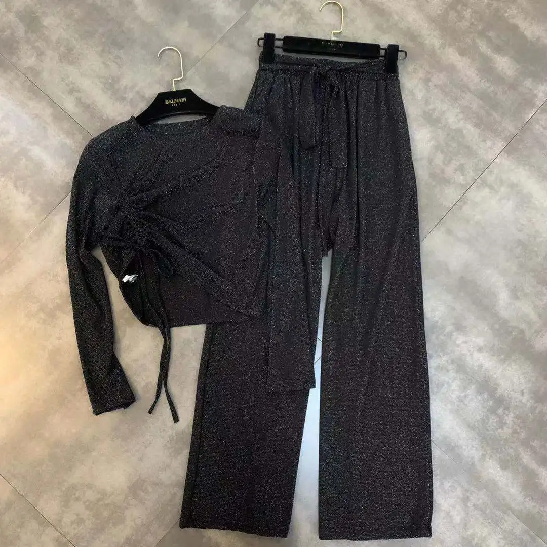 2019 autumn new round neck long-sleeved drawstring short shirt + belt wide-leg pants two-piece suit
2019 autumn new round neck long-sleeved drawstring short shirt + belt wide-leg pants two-piece suit
