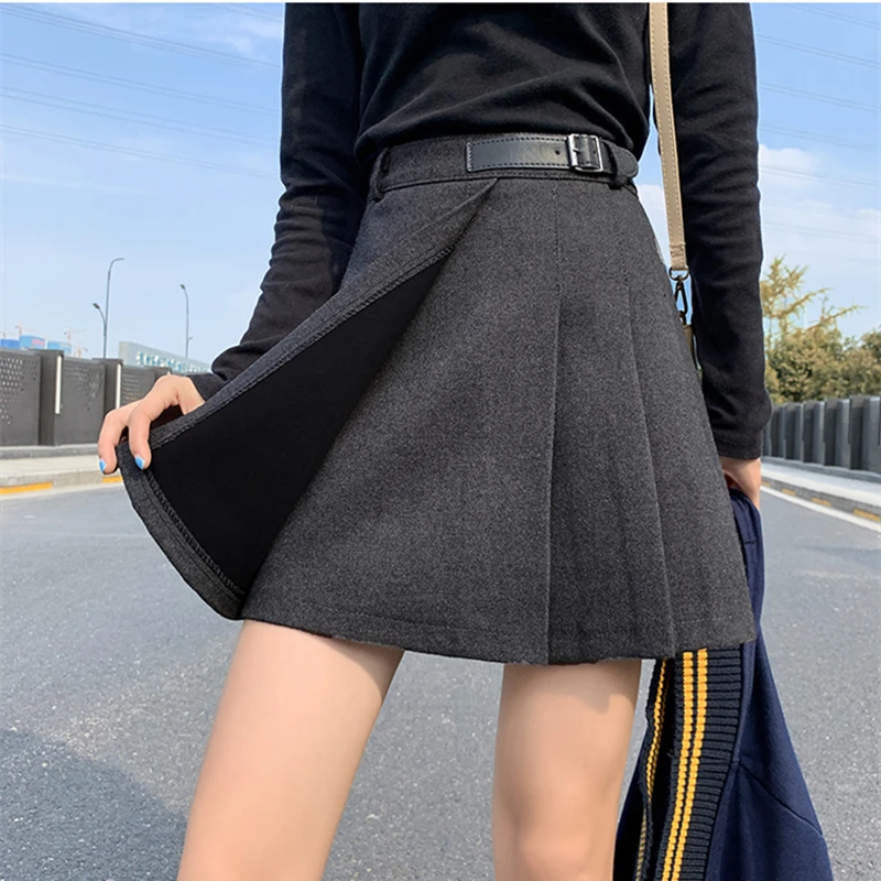 2020 New Autumn Winter Solid Woolen Pleated Skirts Women Pockets A-Line Chic High Waist Sexy Mini Skirts Female
2020 New Autumn Winter Solid Woolen Pleated Skirts Women Pockets A-Line Chic High Waist Sexy Mini Skirts Female
