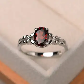European and American Fashion Popular S925 Silver Micro-set Garnet Ruby Ring Oval Pattern Lace Ladies Ring Jewelry
European and American Fashion Popular S925 Silver Micro-set Garnet Ruby Ring Oval Pattern Lace Ladies Ring Jewelry