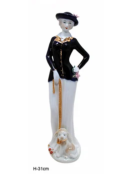 Figurine lady with a dog 31 cm 
Figurine lady with a dog 31 cm