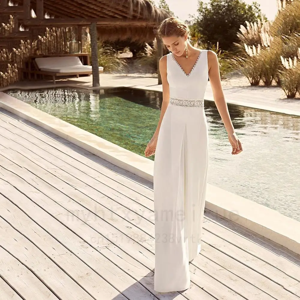 Ivory A-line Pant Suit Wedding Dress 2023 Vestido De Novia Jumpsuit V Neck Satin Bridal Gowns Sleeveless Beading Belt Open Back 
Ivory A-line Pant Suit Wedding Dress 2023 Vestido De Novia Jumpsuit V Neck Satin Bridal Gowns Sleeveless Beading Belt Open Back