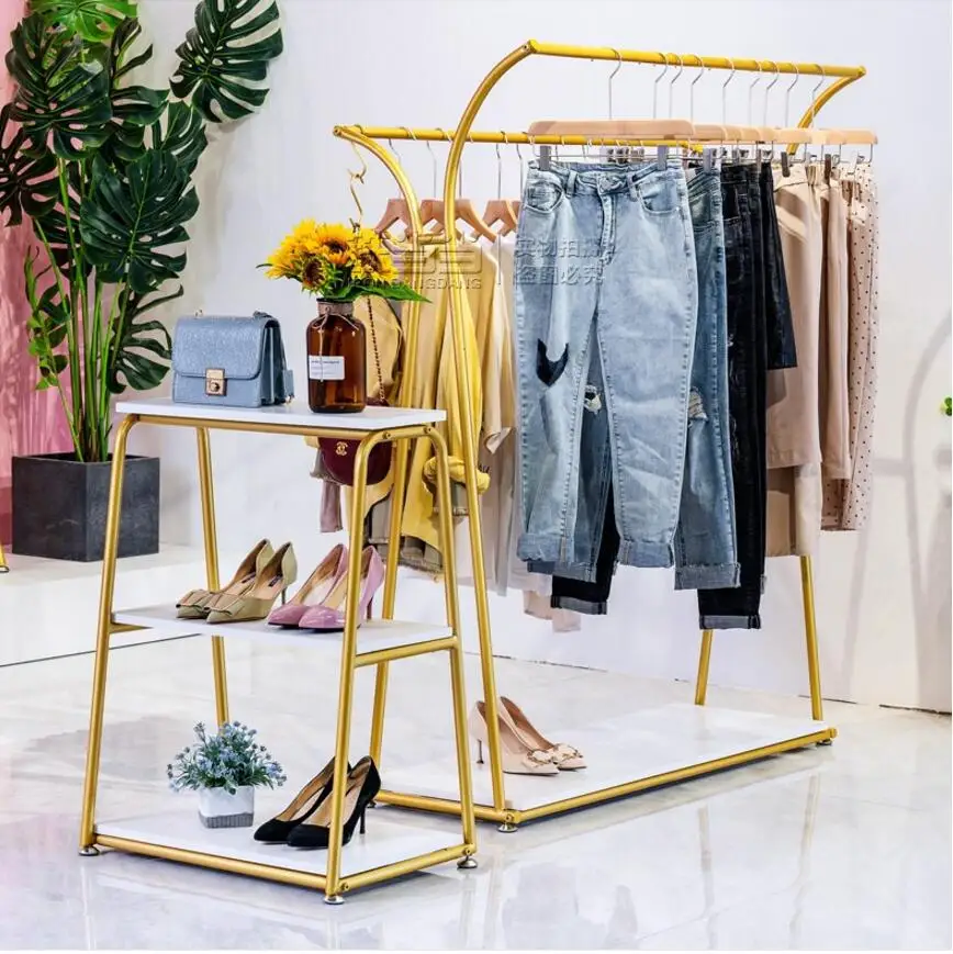 Middle island display rack of clothing store floor type double row clothes rack iron art creative side hanging display rack
Middle island display rack of clothing store floor type double row clothes rack iron art creative side hanging display rack