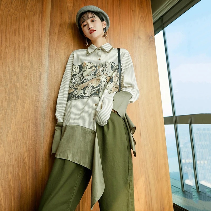 2020 Spring Winter Lapel Long Sleeve Print Pattern Irregular Button Personality Shirt Women Blouse Fashion Tide V136
2020 Spring Winter Lapel Long Sleeve Print Pattern Irregular Button Personality Shirt Women Blouse Fashion Tide V136