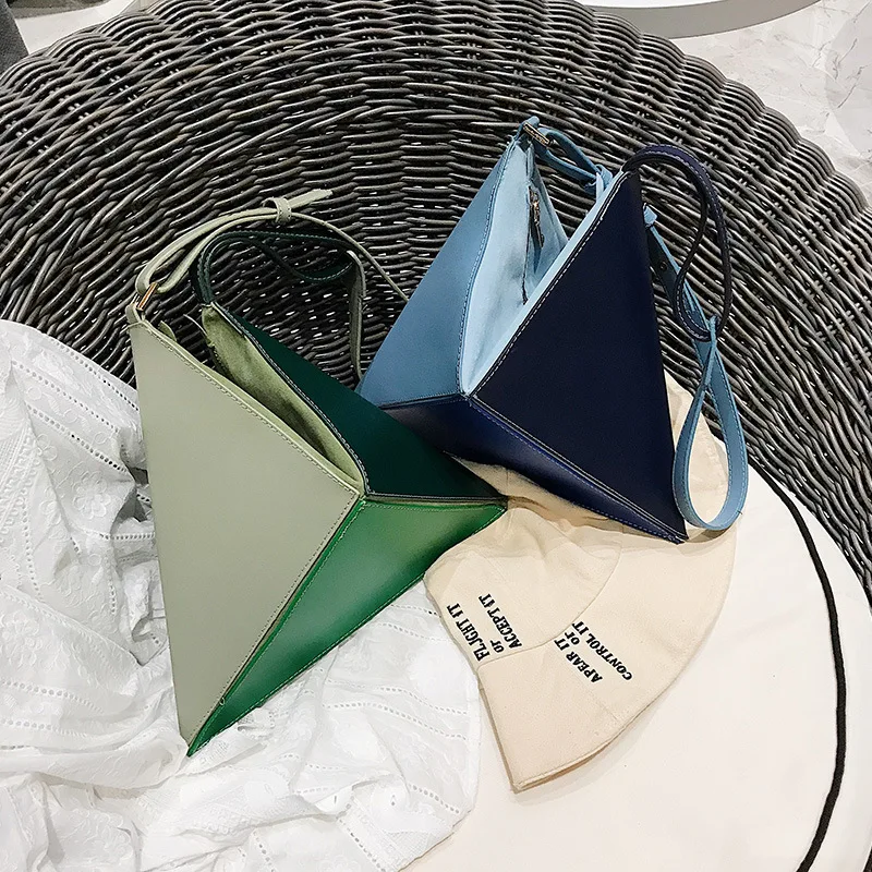 2019 New triangular geometry bag (deformable) multifunctional single shoulder oblique female bag
2019 New triangular geometry bag (deformable) multifunctional single shoulder oblique female bag