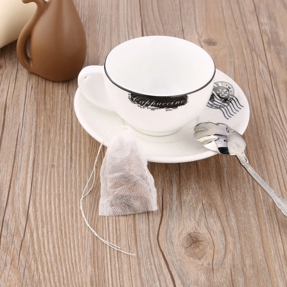 100pcs/lot Draw String Teabags strainer infuser Filter Paper Herb Loose Tea Bags For Home Travel Necessities Tools Drop
100pcs/lot Draw String Teabags strainer infuser Filter Paper Herb Loose Tea Bags For Home Travel Necessities Tools Drop