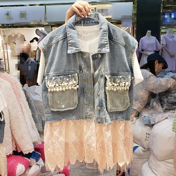 Vest Woman European Style Spring and Summer New Heavy Beaded Diamond Lace Stitching Denim Vest Jacket Female Lace Waistcoat Vest
Vest Woman European Style Spring and Summer New Heavy Beaded Diamond Lace Stitching Denim Vest Jacket Female Lace Waistcoat Vest