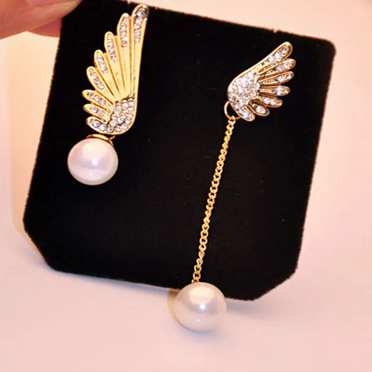 Angel Wings Asymmetric Pearl Fringe Personality Unique Stud Earrings Hypoallergenic Earrings
Angel Wings Asymmetric Pearl Fringe Personality Unique Stud Earrings Hypoallergenic Earrings